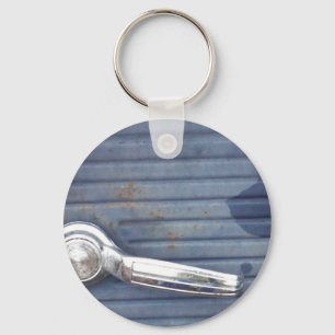 blauwe deur, zilverhandje sleutelhanger