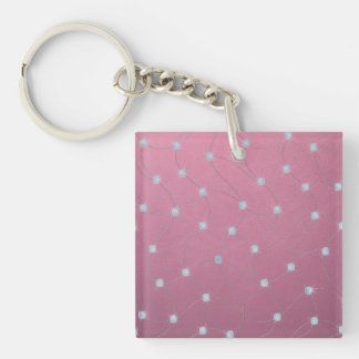 Blauwe diamant op roze leder sleutelhanger