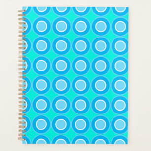 Blauwe donuts met vulling op turquoise planner