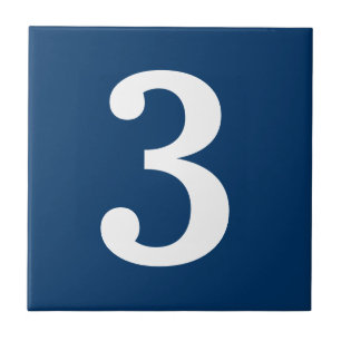 Blauwe en witte het huisnummertegel van het tegeltje