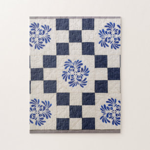 Blauwe en witte quilt legpuzzel