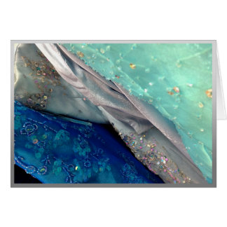 Blauwe, groene, grijze promjurken.