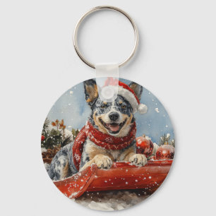 Blauwe Heeler-hond in slee Laat het sneeuwen Kerst Sleutelhanger