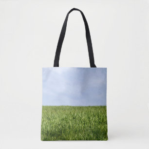 Blauwe hemel en groene gras (de Dag van de Aarde i Draagtas