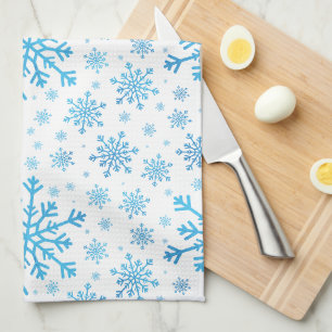 blauwe kerstsnowflakes op winterwit theedoek