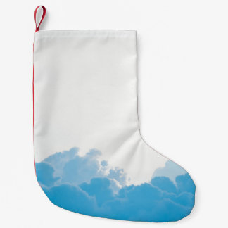 BLAUWE KLEDINGEN ONDER WITTE SKY KLEINE KERSTSOK