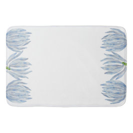 Blauwe krijtstokken op een badmat