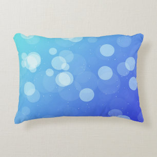 Blauwe kussen met abstract verloopdesign