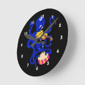 blauwe octopus die veelvoudige klopping speelt.png ronde klok (Hoek)