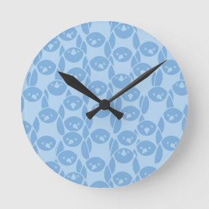 Blauwe pinguïnpatroonachtergrond ronde klok