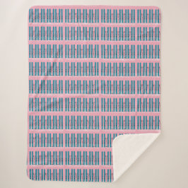 Blauwe ski's op roze deken