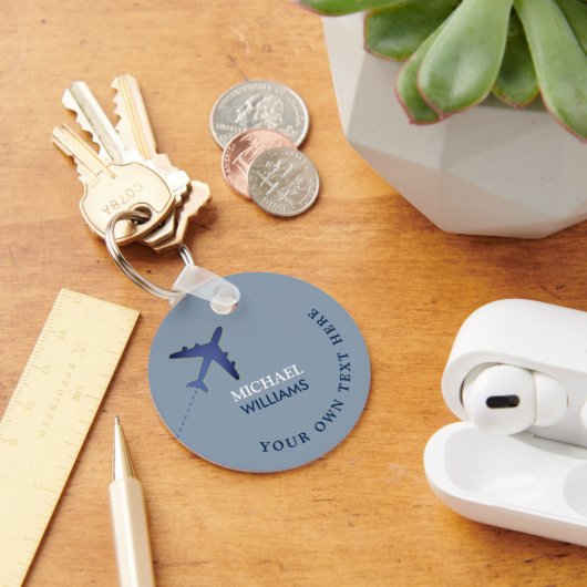 blauwe sleutelhanger van het vliegtuig met naam (Bureau)