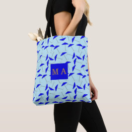 blauwe strandparaplu ' s - monogram herhaald patro draagtas