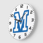Blauwe varsity letter M monogram Grote Klok (Hoek)