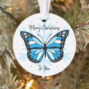 Blauwe vlinder op een sneeuwvlok Kerstmis Ornament