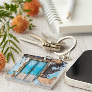 Blauwe wand en deur sleutelhanger