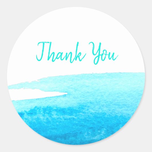 Blauwe waterverf langs de oceaan ronde sticker (Voorkant)