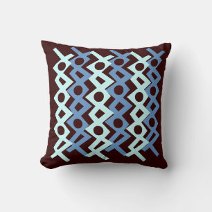 blauwgroen blauw patroon op bruine kussen
