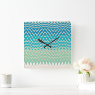 Blauwgroen blauw, turquoise en groene zigzags vierkante klok