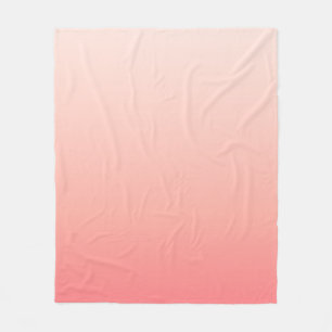Bleke roze en perzikgradiënt fleece deken