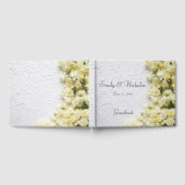 Bleke smaakbloemen op textuur gastenboek (Volledig)