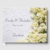 Bleke smaakbloemen op textuur gastenboek (Voorkant)