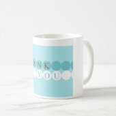 Bleu et blanc entoure la tasse de Merci (Devant droit)