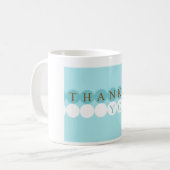 Bleu et blanc entoure la tasse de Merci (Devant gauche)