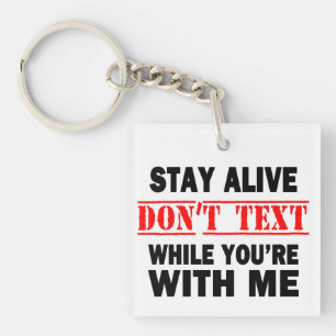 Blijf leven. Sms niet terwijl je bij me bent Sleutelhanger