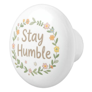 Blijf nederig aardetinten tekst op wit keramische knop