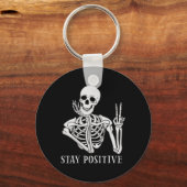 Blijf positief Nooit Beter Skelet Fun Halloween Sleutelhanger (Voorkant)
