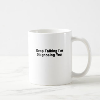 Blijf praten... Ik diagnoseer je T-Shirts.png. Koffiemok