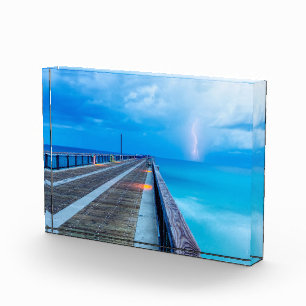 bliksem op Navarra Beach pier Fotoblokken