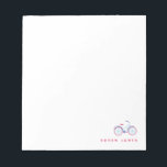 Bloc-note Balade à vélo<br><div class="desc">Ce bloc-notes avec un vélo rouge et bleu est un cadeau merveilleux pour le cycliste dans votre vie. Parfait pour les petits et les grands. Une partie d'une collection de Parcel Studios.</div>