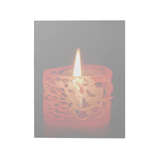 Bloc-note Bougie sur un arrière - plan noir (Tourné)