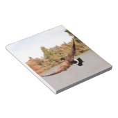 Bloc-note canard volant au-dessus de l'eau photo (Incliné)