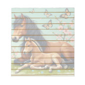 Bloc-note Cheval et poulain se reposent dans un cadre de pri (Devant)