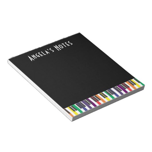 Bloc-note Clés de piano arc-en-ciel sur noir (Incliné)