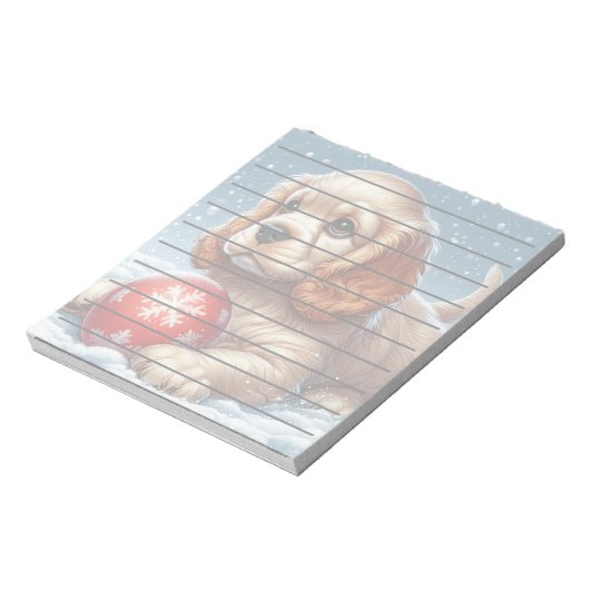 Bloc-note Cocker Spaniel Chiot posé sur la neige avec une ba (Tourné)