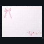 Bloc-note Coquette aquarelle Pink Bow ruban personnalisé<br><div class="desc">Ajoutez une touche de douceur à vos notes quotidiennes grâce à ce bloc-notes personnalisé doté d'un arc rose et d'un ruban d'aquarelle souple. Parfait pour ajouter du charme à vos fournitures de bureau, ce bloc-notes personnalisé peut être personnalisé avec votre nom ou un message spécial, ce qui en fait un...</div>