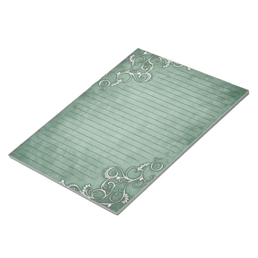 Bloc-note Filigree blanc sur papier à papier à lettres vert  (Incliné)