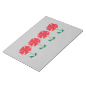 Bloc-note fleurs rouges sur remplissage arrière - plan gris (Incliné)