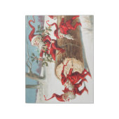 Bloc-note Gnomes dragging a cut tree trunk through the snow (Tourné)