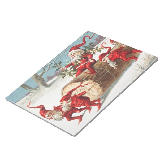 Bloc-note Gnomes dragging a cut tree trunk through the snow (Incliné)