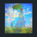 Bloc-note Monet Woman avec un parasol<br><div class="desc">Un bloc-notes de portrait familial avec Camille,  épouse de Claude Monet,  tenant un parasol,  et son fils Jean,  se promenant dans un champ vert vif soufflé par le vent pendant une journée d’été. Un grand cadeau Monet pour les amateurs d'impressionnisme et d'art français.</div>
