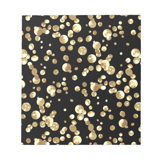 Bloc-note Pois or sur un arrière - plan noir. (Devant)