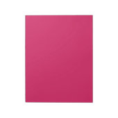 Bloc-note un arrière - plan rose avec une bordure blanche (Tourné)
