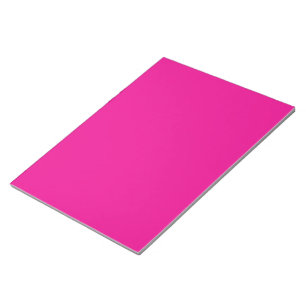 Bloc-note un arrière - plan rose avec une bordure noire