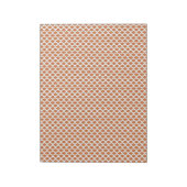 Bloc-note un motif géométrique orange et blanc (Tourné)