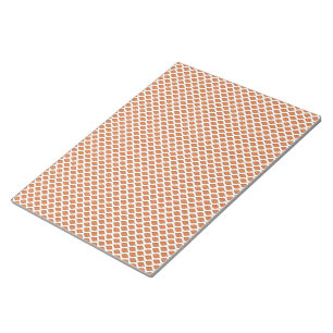 Bloc-note un motif géométrique orange et blanc
